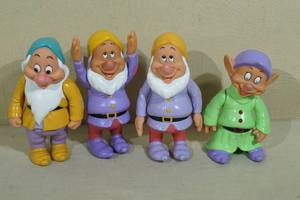 lot 99 image: Walt Disney Dwarfs Figures - Happy, Doc, Bashful