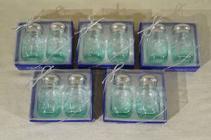 lot 131 image: Beach Theme Glass Jar Salt and Pepper Shakers