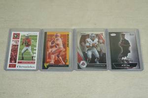 lot 74 image: Justin Fields Rookie Cards - Prizm, Sage, Flux, Chronicles
