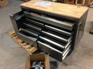 lot 23 image: Husky 61 in. W 10-Drawer, Deep Tool Chest Mobile Workbench in Metallic Silver with Sliding Vertical Bin Storage Drawer Customer Returns See Pictures