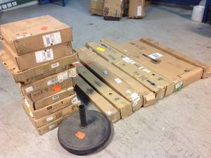 lot 29 image: Lot of Patio Umbrella Base Weight and Umbrella Customer Returns See Pictures