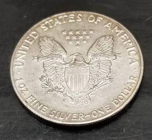 1987 AMERICAN SILVER EAGLE 1 TROY OZ .999 FINE SILVER DOLLAR