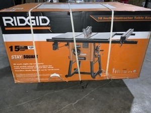 lot 60 image: RIDGID 10 in. Contractor Table Saw with Cast Iron Top. See Pictures