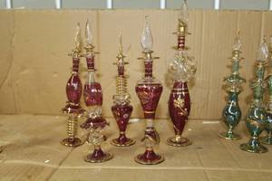 lot 172 image: Lot of (5) Hand Blown Decorative Pyrex Glass Egyptian Oil Canter with Stopper Maroon14k Gold Accent