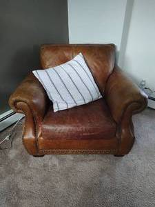 lot 12 image: Leather Chair with Throw Pillow