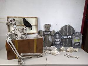 lot 209 image: Halloween Outdoor Decor Skeletons, Trunk, and Headstones - A