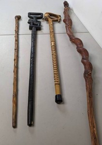 lot 307 image: Set of (4) Unique Hand Carved Walking Sticks Warrior, Lion, & More - B