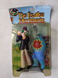 lot 369 image: McFarlane Beatles Yellow Submarine Sgt. Pepper Action Figures (Paul with Sucking Monster) - B