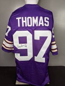 lot 396 image: Minnesota Vikings NFL Autographed Football Jersey Signed by Henry Thomas - B