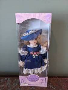 lot 706 image: Beautiful Bisque Porcelain Doll - W