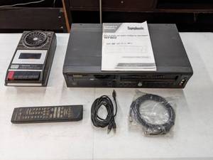lot 524 image: Symphonic DVDVHS Player with Remote and Realistic Cassette Recorder -E