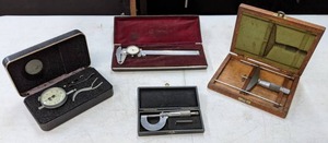 lot 544 image: Antique Tool Lot Mitutoyo Dial Caliper Washer Bezel Clamp, Micrometer Machinist Tool, Micrometer Flat Anvil, & More - E