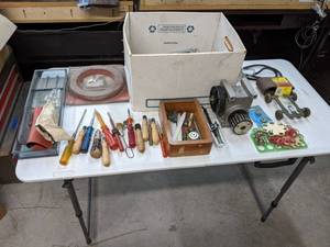 lot 553 image: Lot of Miscellaneous ToolsGarage Items - Cable Clamps, Stethoscope, Sanding Belts, Craftsman Band Saw Blade, Screwdrivers, and more E