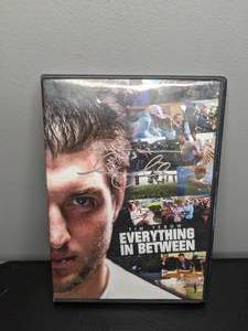 lot 115 image: Tim Tebow Autographed Everything in Between DVD NFL Broncos Jets Patriots Football - T
