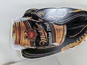 lot 42A image: Miller Genuine Draft Beer Can in Baseball Glove Tin Sign - N