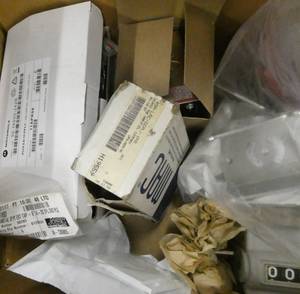 Box of New MAC valves, banner mounting brackets, motorola power supply, veeder root counter,