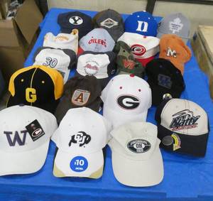 19 various ball caps, even one with a built in bottle opener