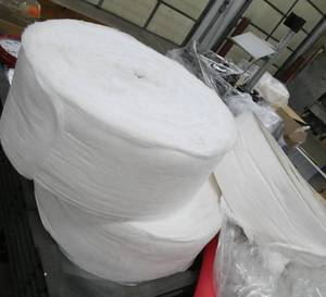 big rolls of packaging material, approx 850 ft each