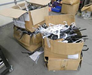 4 large boxes full of clothes hangers