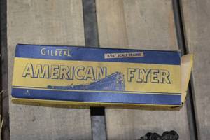 lot 5 image: Vintage Train Set including cars, rails, and toy transformer