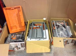 Pallet with 3 RIDGID 9 Amp Corded 7 in. Wet Tile Saws open box customer returns various conditions&nbsp Customer Returns See Pictures
