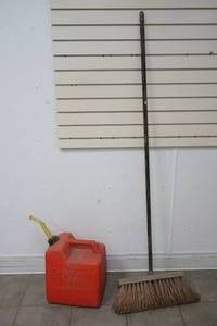 shop broom and gas can