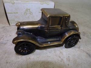 lot 4 image: BANTHRICO Inc. Cast Iron Car Bank with Box