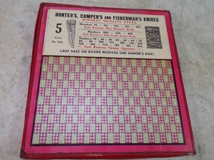 lot 45 image: Super Rare Gamble Punch Board Winning Numbers Win Knifes