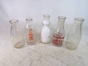 lot 63 image: 5 Vintage Glass Milk Bottles