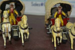 lot 31A image: Collectable old west covered wagons battery operated cowboy universal toys, easel, and toy transformer