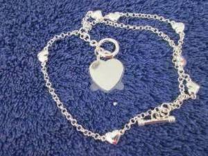 lot 16 image: Silvertone Personalized Heart Charm...