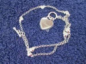lot 17 image: Silvertone Personalized Heart Charm...