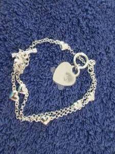 lot 110 image: Silvertone Personalized Heart Charm...
