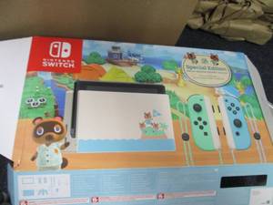 lot 168 image: Nintendo Switch Console New Horizon...