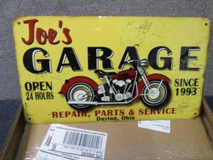 lot 171 image: Tin Garage Sign...