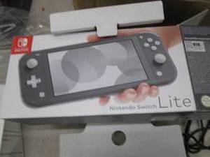 nintendo switch lite and 11in 1 acc...