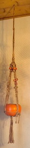 lot 61 image: Vintage Macrame Plant Hanger and Planter
