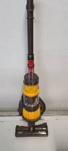 lot 47 image: Casdon Toy Dyson Upright Vacuum