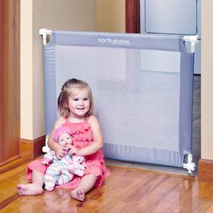 lot 95 image: Toddleroo by North States 42.6 wide Portable Traveler Baby Gate