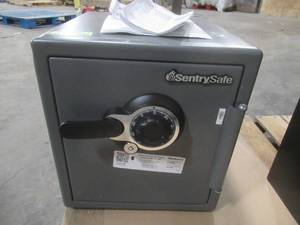 lot 324 image: SentrySafe 1.2 cu. ft. Steel Fire-Resistant and Waterproof Safe with Combination Dial Lock in Gray - Dent on Corner - Have Combination.