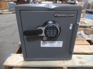 lot 326 image: SentrySafe 1.2 cu. ft. Steel Fire-Resistant and Waterproof Safe with Digital Lock in Gray - Dent on Center Top - Could not Open.