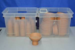lot 11 image: Terra Cotta cupcake pots bottoms are 4 round