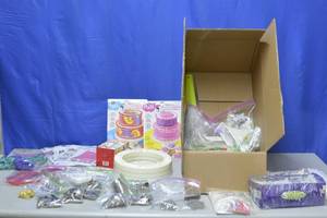 lot 101 image: Box of decorating items, pillars, cake tattoos, icing tips  more