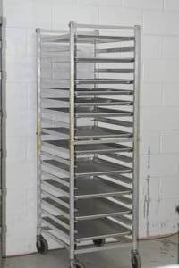 lot 30A image: Assorted 12 and full sheet pans on speed rack