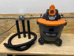 lot 38 image: RIDGID 9 Gal. 18-Volt Cordless WetDry Shop Vacuum (Tool Only)