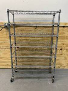 lot 42 image: NSF 7 Shelf Storage Cart on Casters