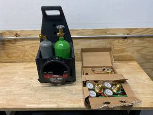 lot 26 image: LINCOLN ELECTRIC Port-A-Torch Kit with Oxygen and Acetylene Tanks and 316 in. x 12 ft. Hose, for Cutting Welding and Brazing