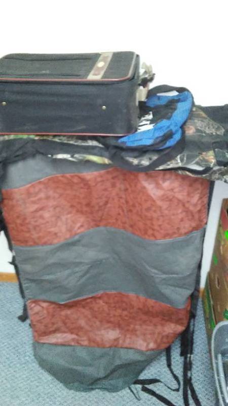 lot 80 image: Camo gear high Cabelas, suitcase and more.