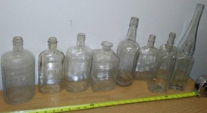 lot 204 image: (10) Antique Liquor Bottles. Gordon And more.