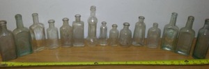 lot 205 image: (15) Small Bottles. Castoria, Fletchers and More.